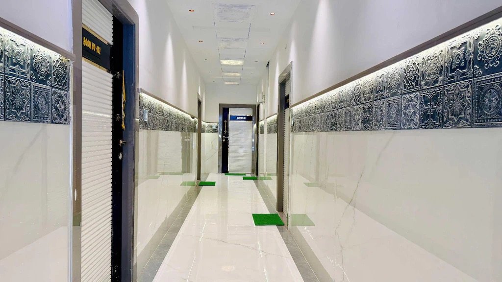 Elegant hotel corridor with ornate tile work